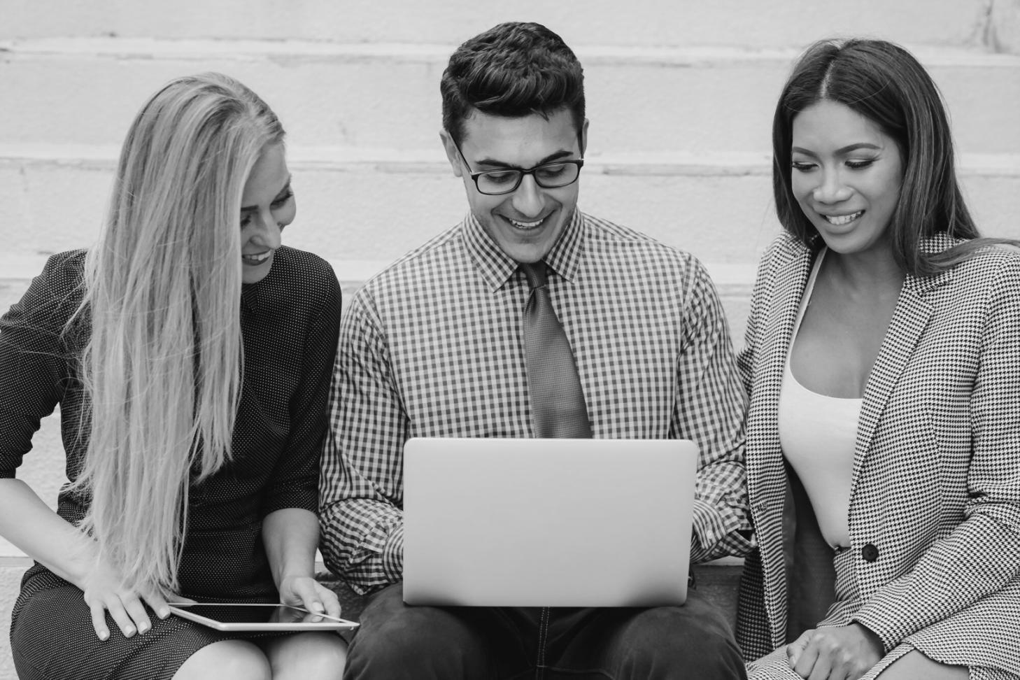 Person reviewing financial documents and budget planning materials on a desk